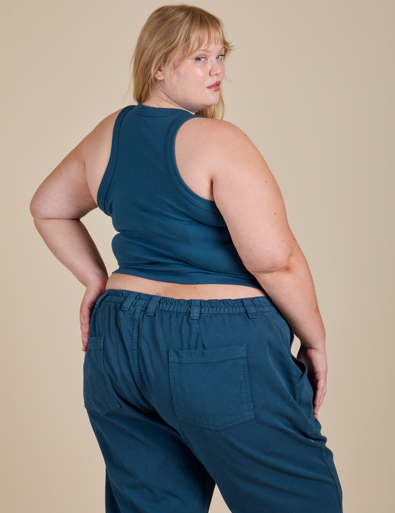Racerback Tank in Lagoon angled back view on Juliet