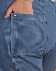 Close up of Juliet's hand in the back pocket of Railroad Denim Work Pants in Natural