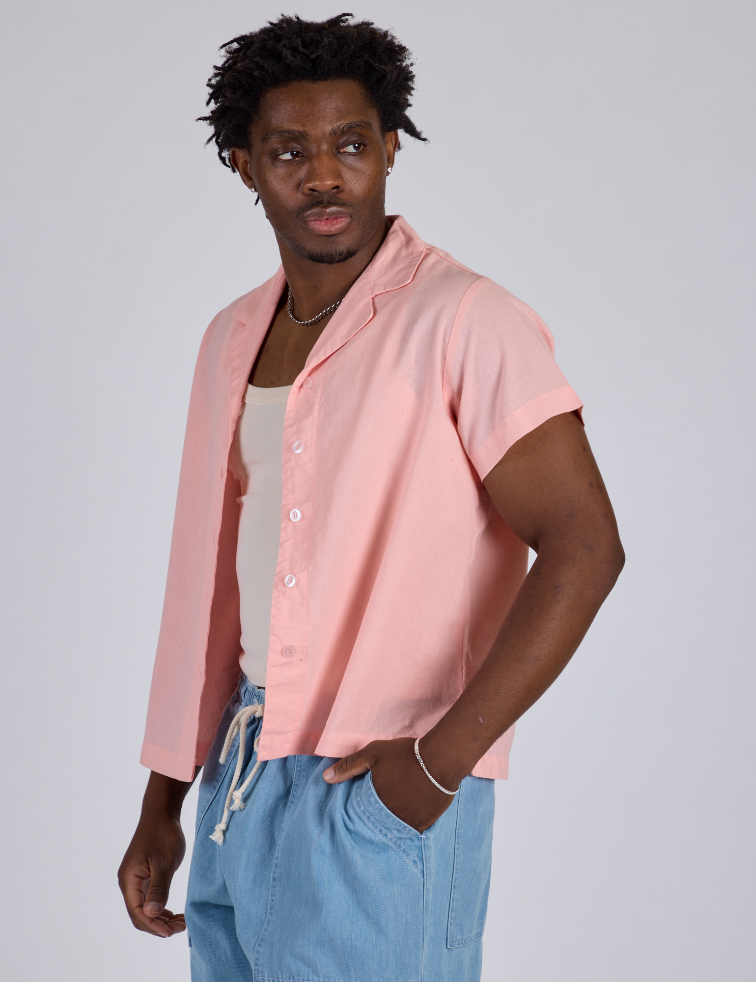 Pantry Button-Up in Baby Pink side view on Isaac
