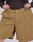 Longline Work Shorts in Desert Brown front close up on Juliet