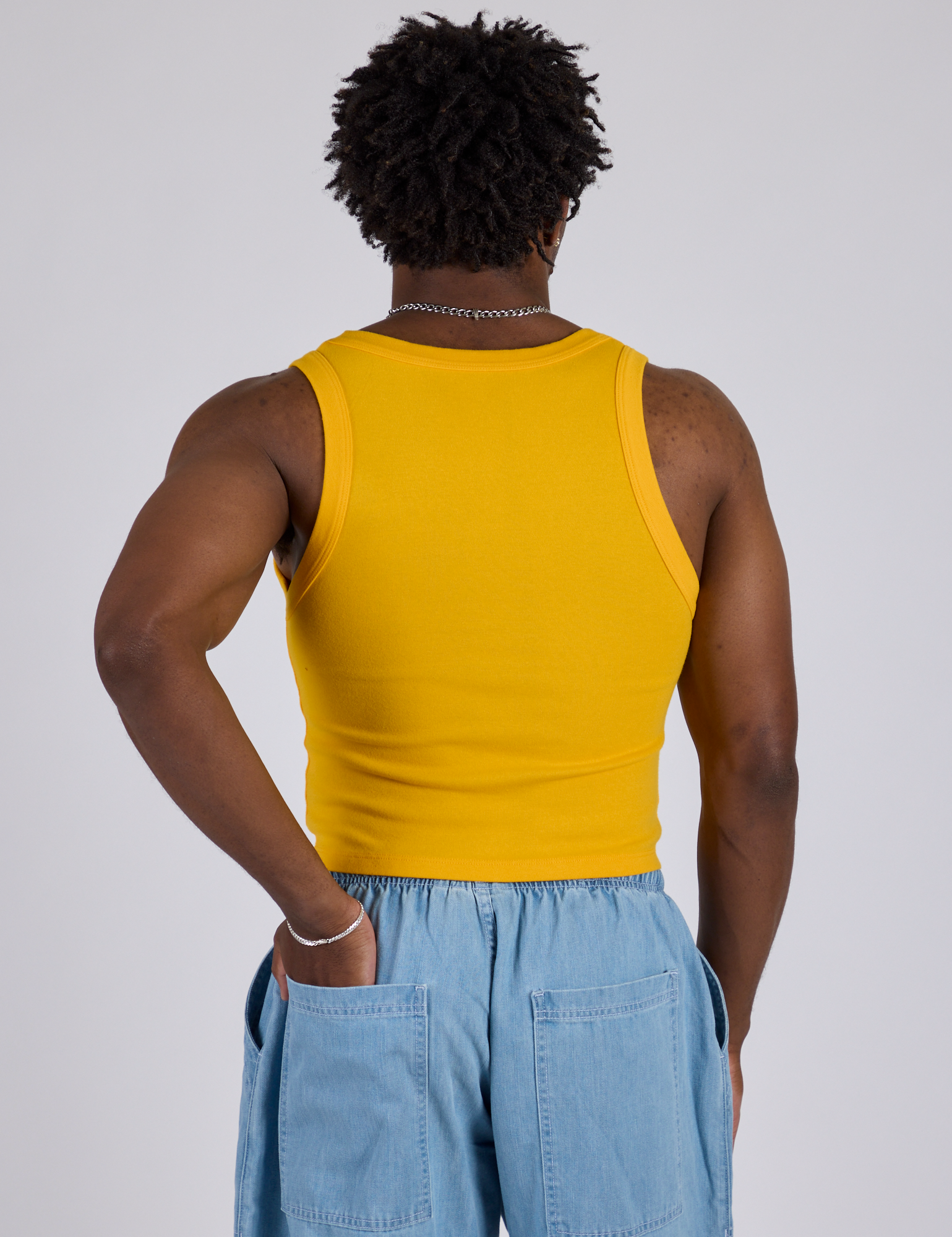 Cropped Tank Top in Sunshine Yellow back view on Isaac