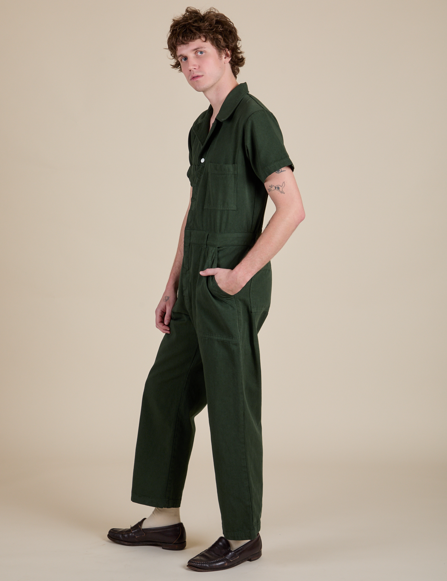 Side view of Short Sleeve Jumpsuit in Swamp Green on Quinn
