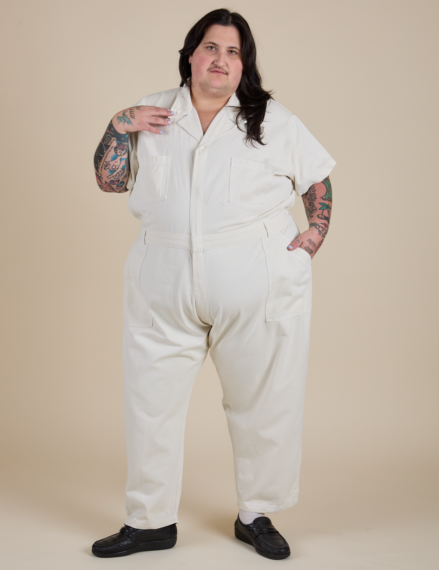 Sam is 5'10" and wearing 4XL Short Sleeve Jumpsuit in Vintage Tee White
