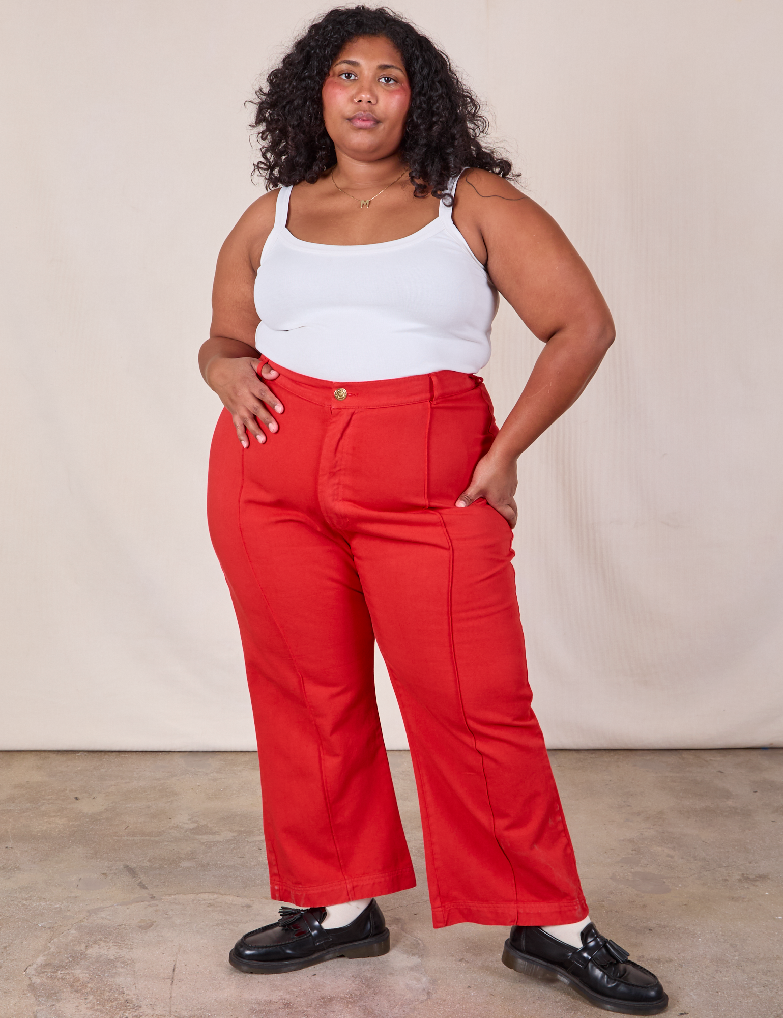 Morgan is 5'5" and wearing 2XL Western Pants in Mustang Red paired with a Cami in Vintage Tee Off-White