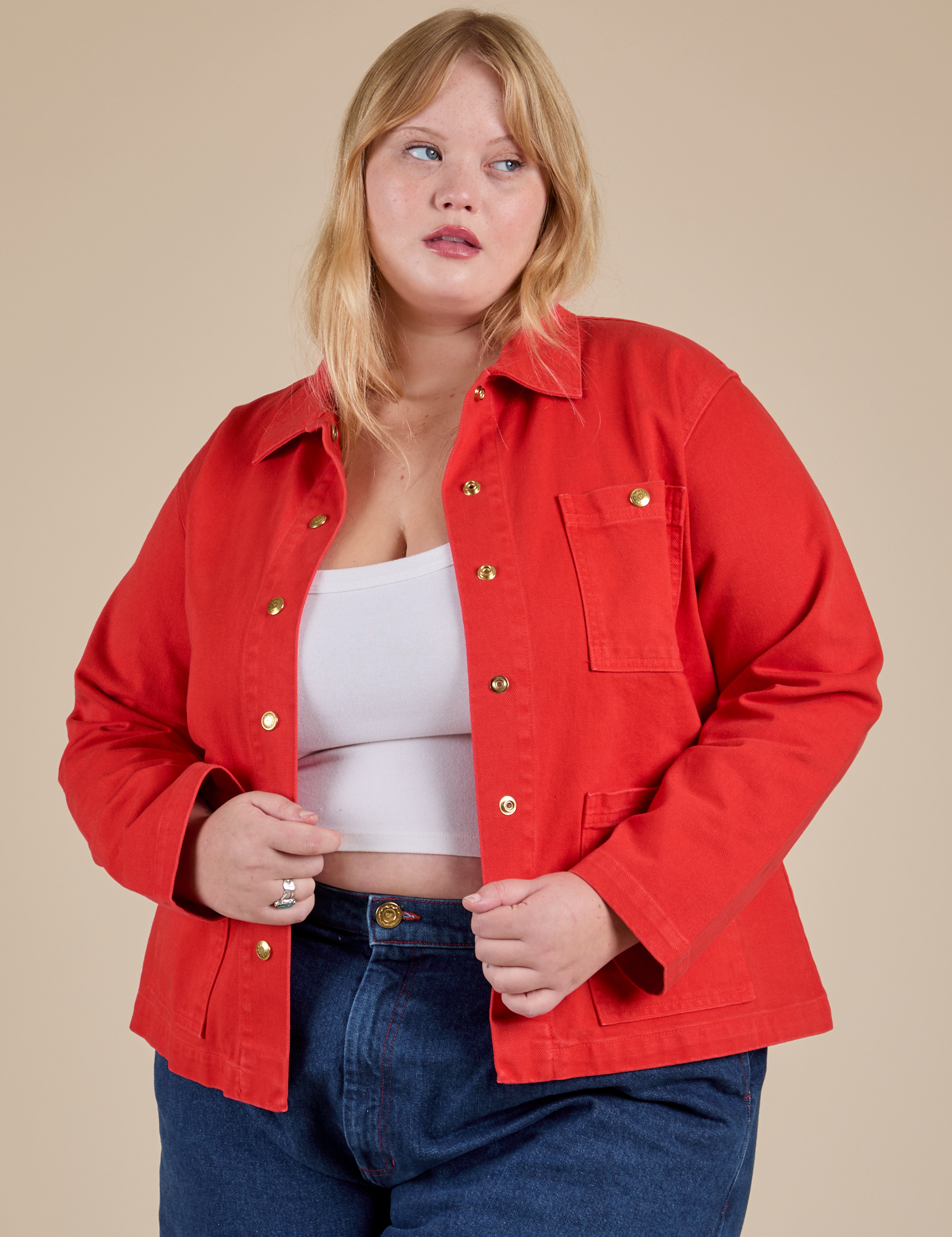Juliet is 5'8" and wearing L Denim Work Jacket in Mustang Red
