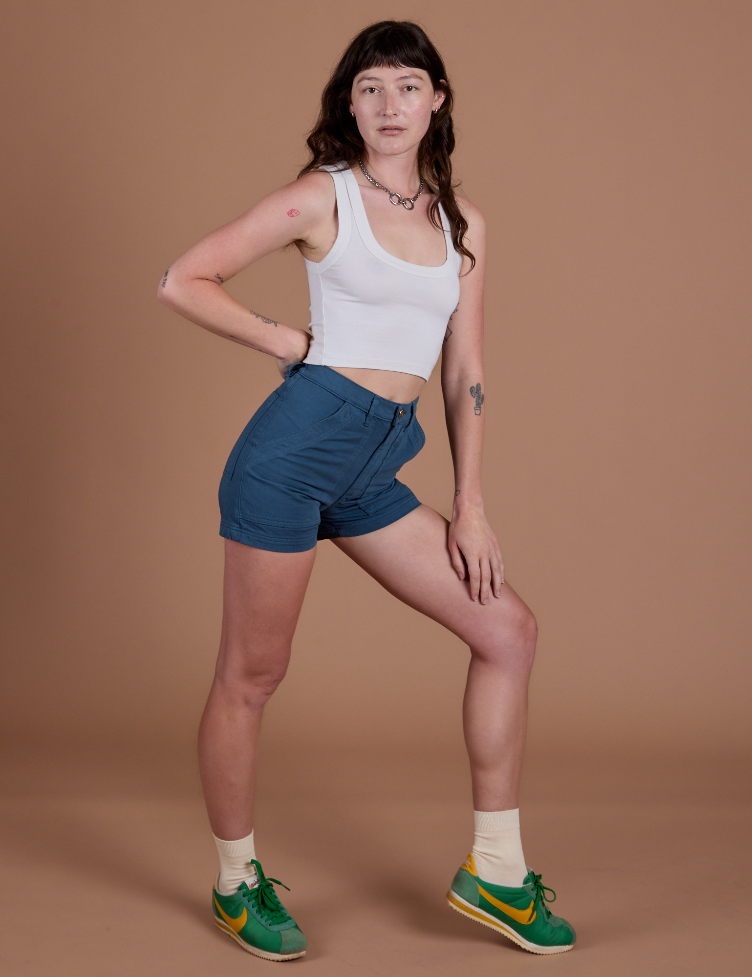 Side view of Classic Work Shorts in French Blue and Cropped Tank in Vintage Tee White