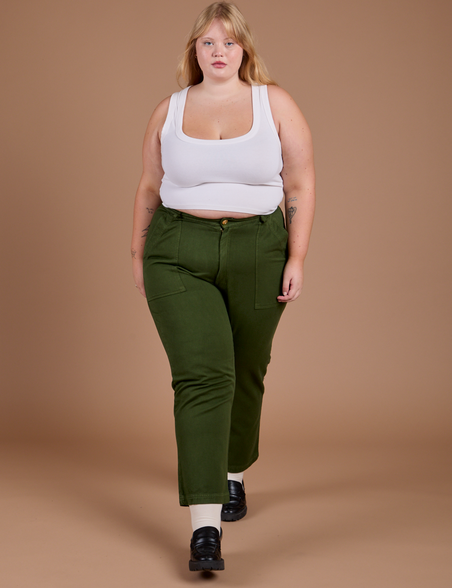 Organic Work Pants in Evergreen and vintage tee white Cropped Tank on Juliet