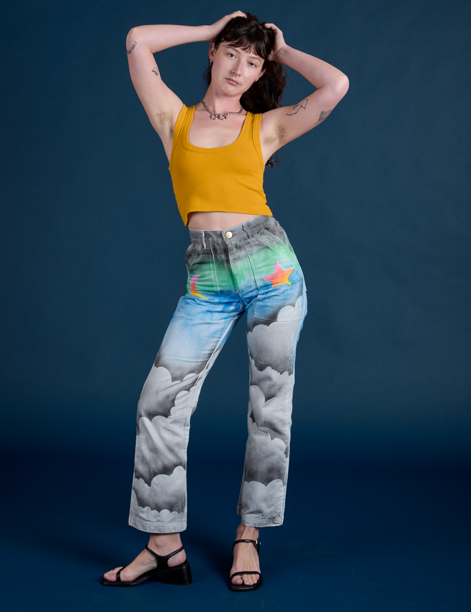 Work Pants in Night Sky Airbrush and mustard yellow Cropped Tank on Alex