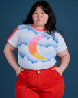 Ashley is wearing Airbrush Moon Vintage Tee tucked into mustang red Work Pants