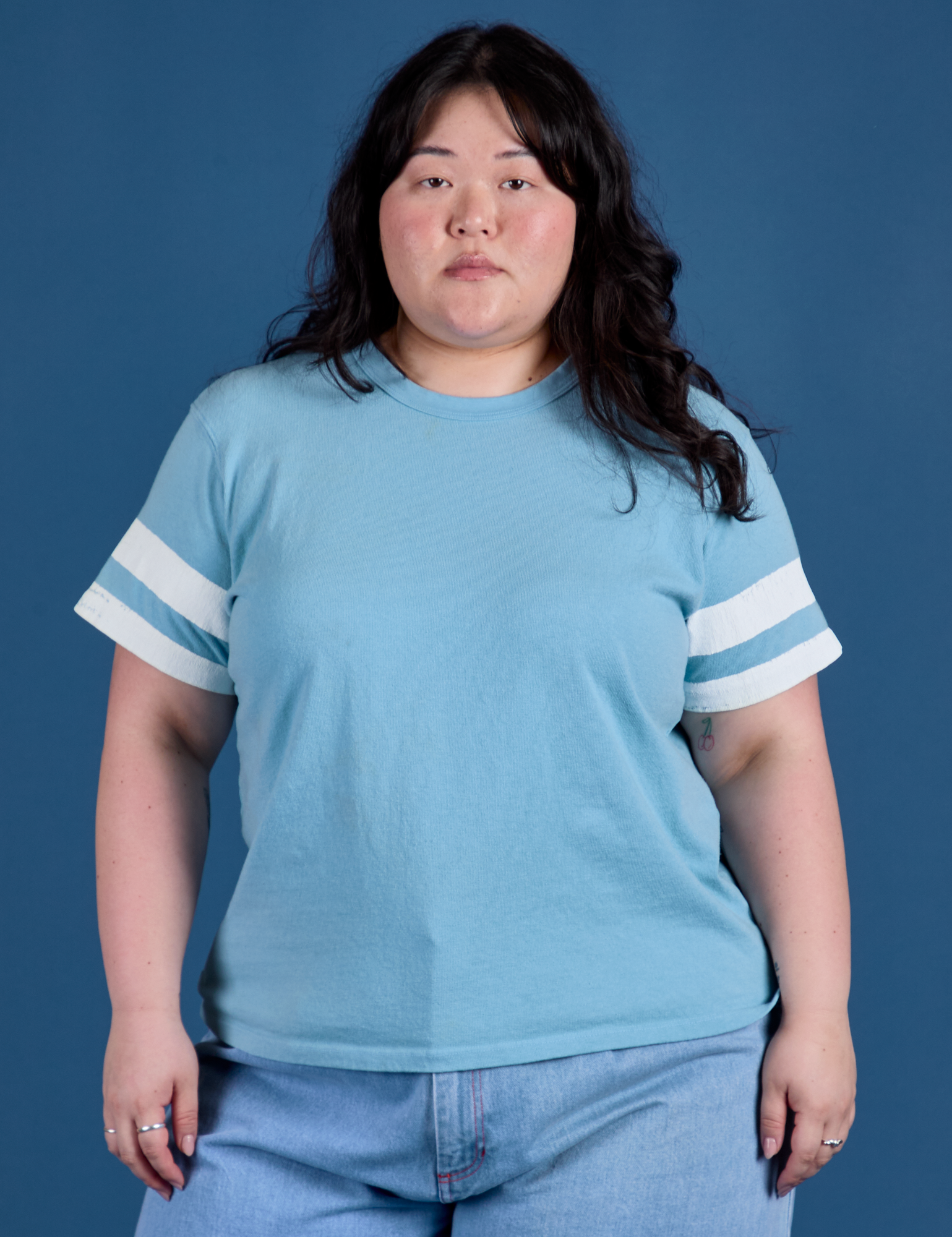 Ashley is 5’7” and wearing L Painted Burly Tee in Baby Blue