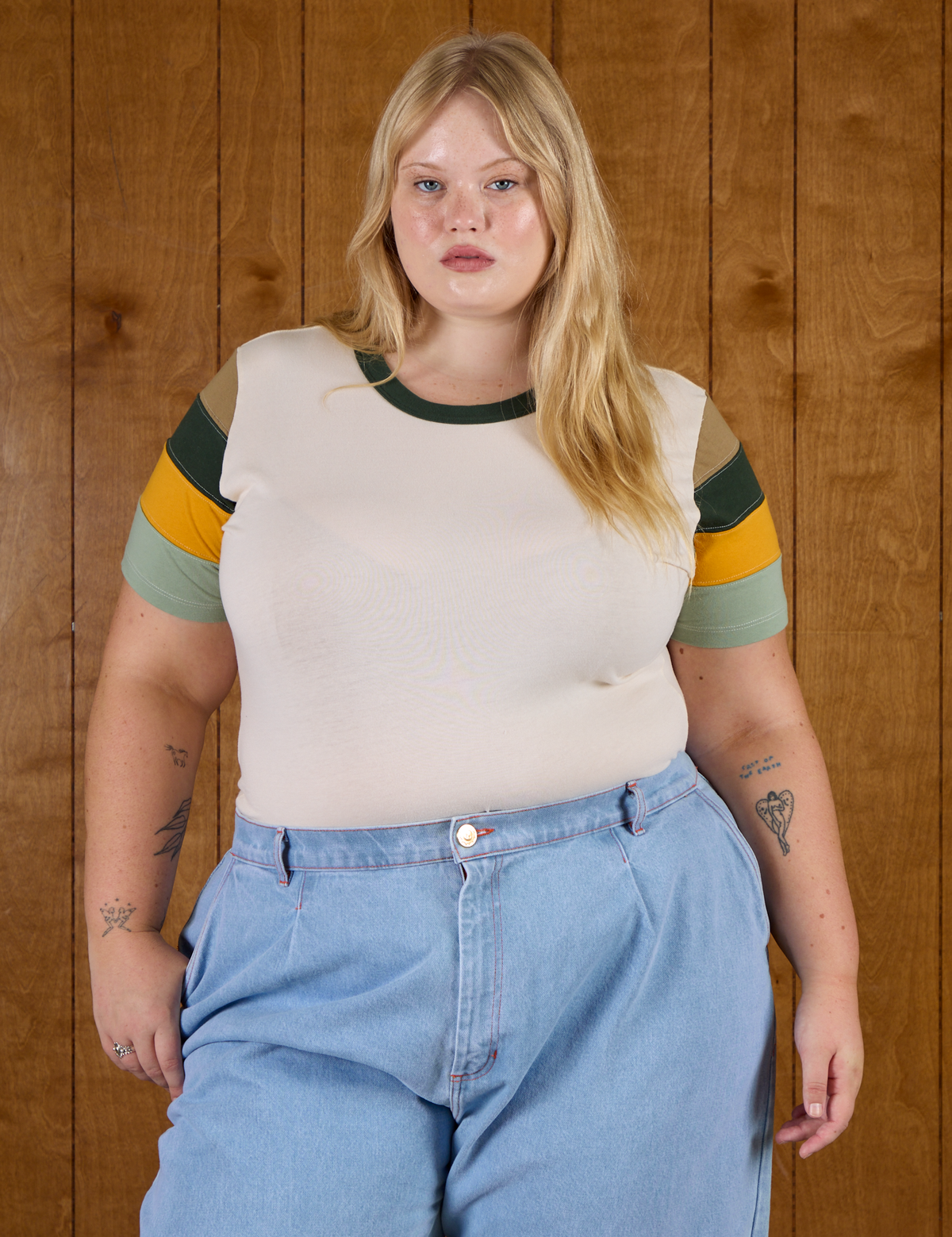 Juliet is 5'7" and wearing L Calypso Tee in Off White Multi