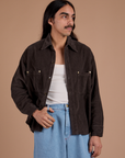 Anthony is 5'6" and wearing S Cropped Corduroy Overshirt in Espresso Brown