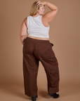 Back view of Drop Pocket Cargo Pants in Fudgesicle Brown and Cropped Tank in vintage tee white