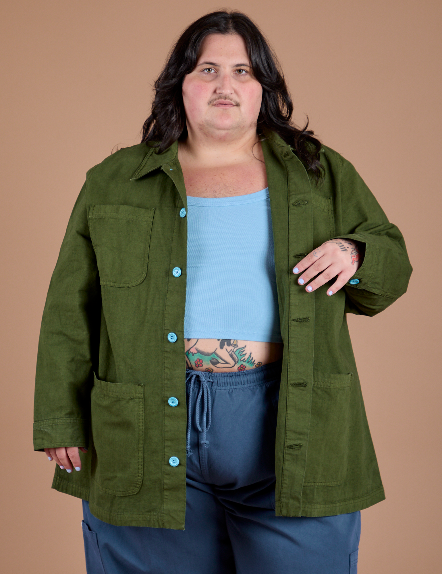Sam is 5'10" and wearing 2XL Ripstop Field Coat in Evergreen