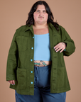 Sam is 5'10" and wearing 2XL Ripstop Field Coat in Evergreen