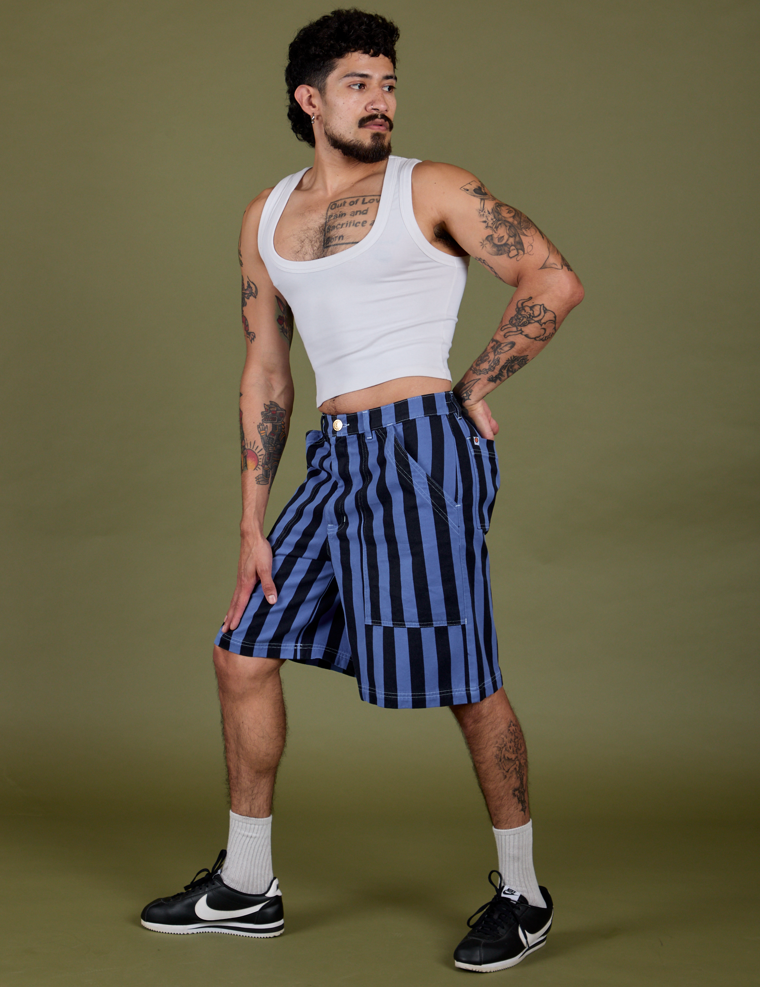Angled front view of Longline Work Shorts in Cornflower and Cropped Tank in Vintage Tee White on Jesse