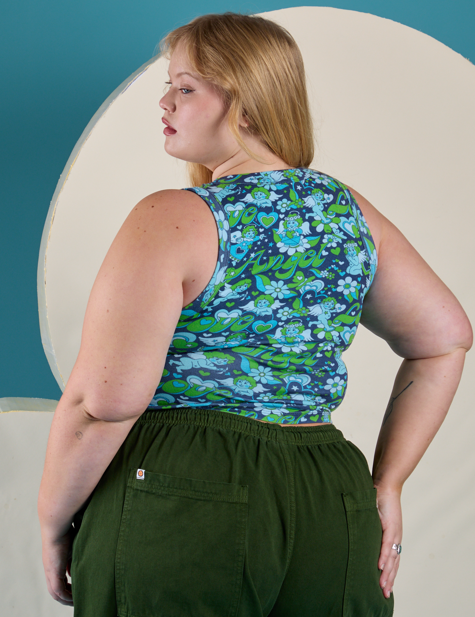 Angled back view of Cropped Tank Top in Angel Print on Juliet