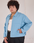 Mechanic Jacket in Baby Blue angled front view on Miguel