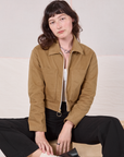 Alex is wearing Mechanic Jacket in Desert Brown
