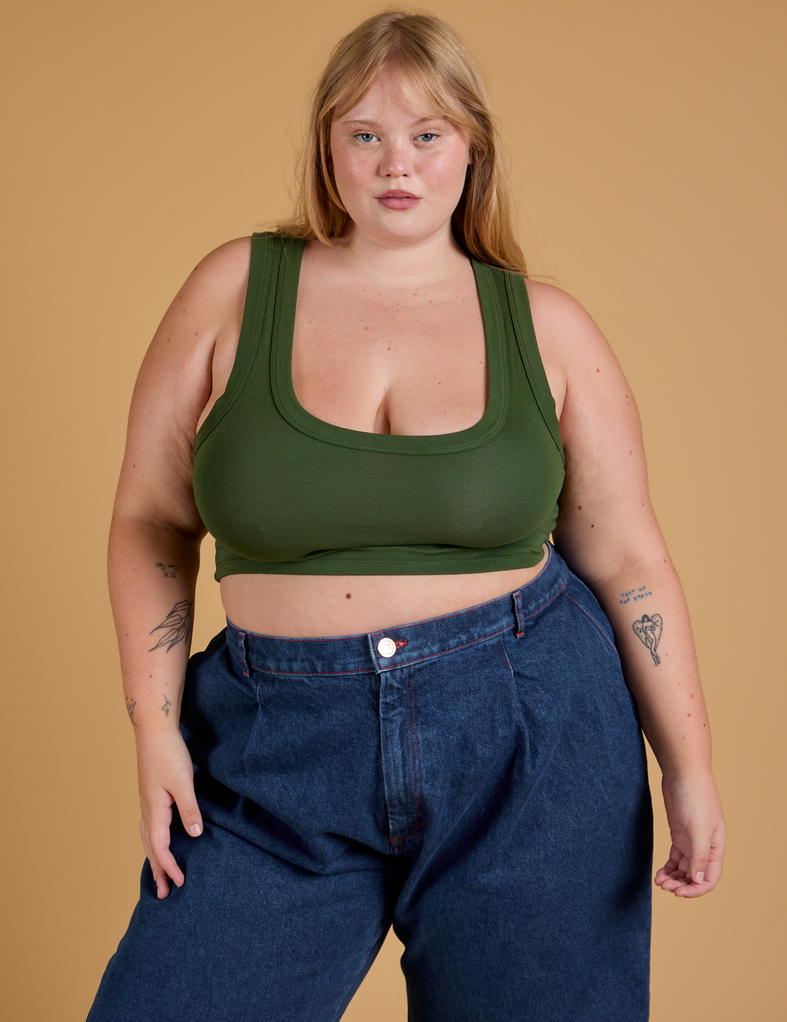 Juliet is 5’7” and wearing L Mini Tank in Evergreen