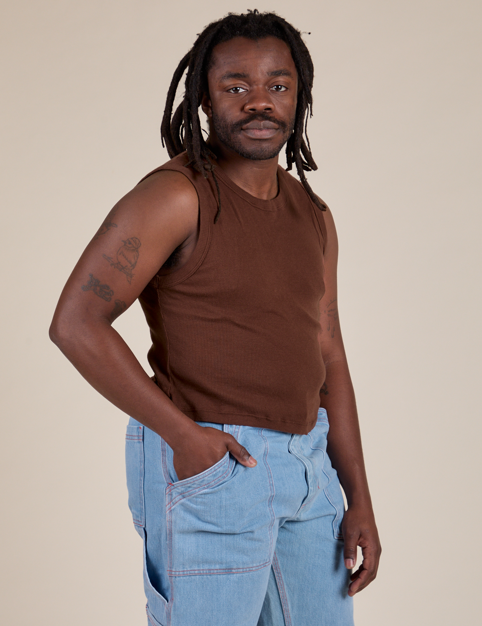Angled front view of Muscle Tee in Fudgesicle Brown on Demi