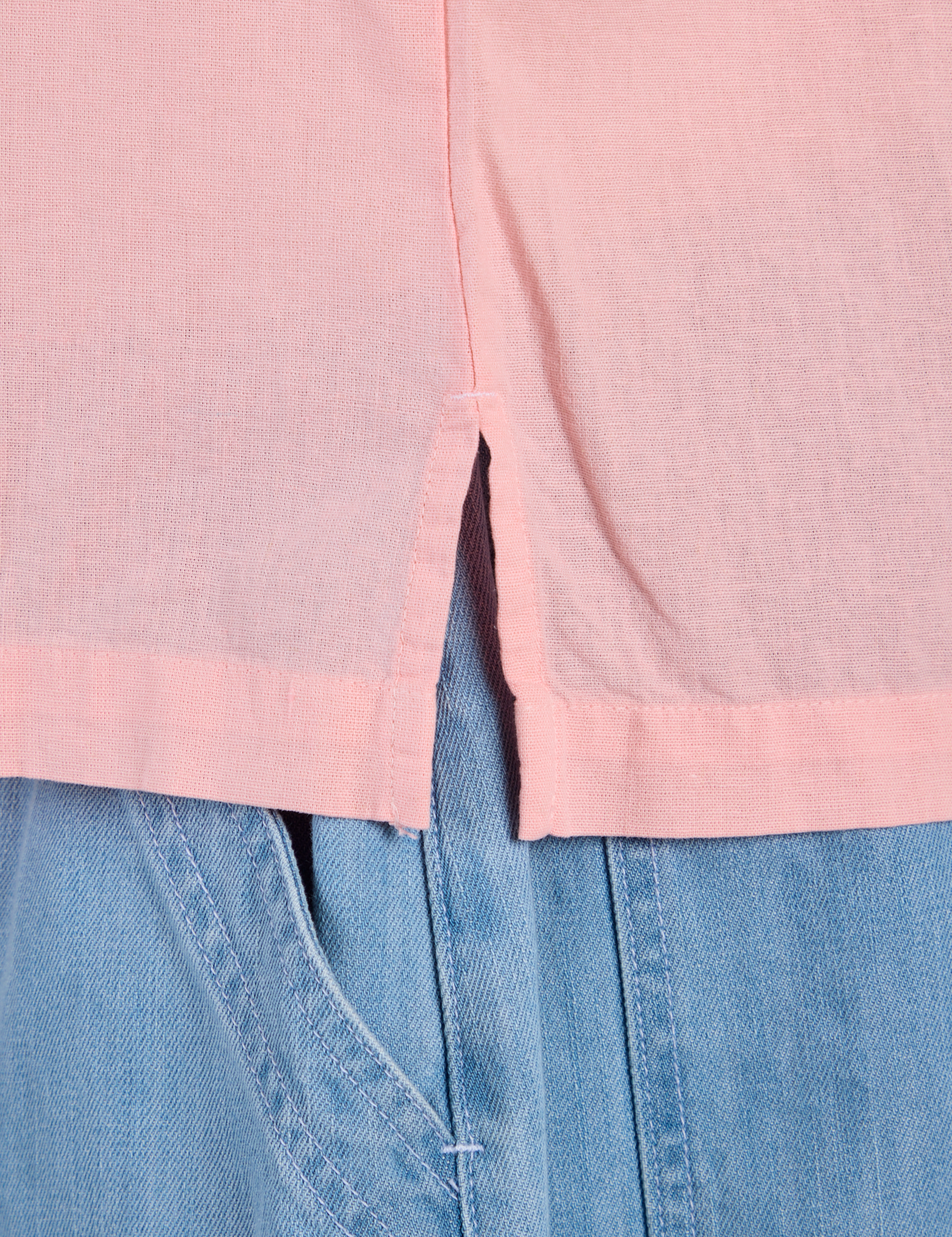 Close up of Pantry Button-Up in Baby Pink side vent