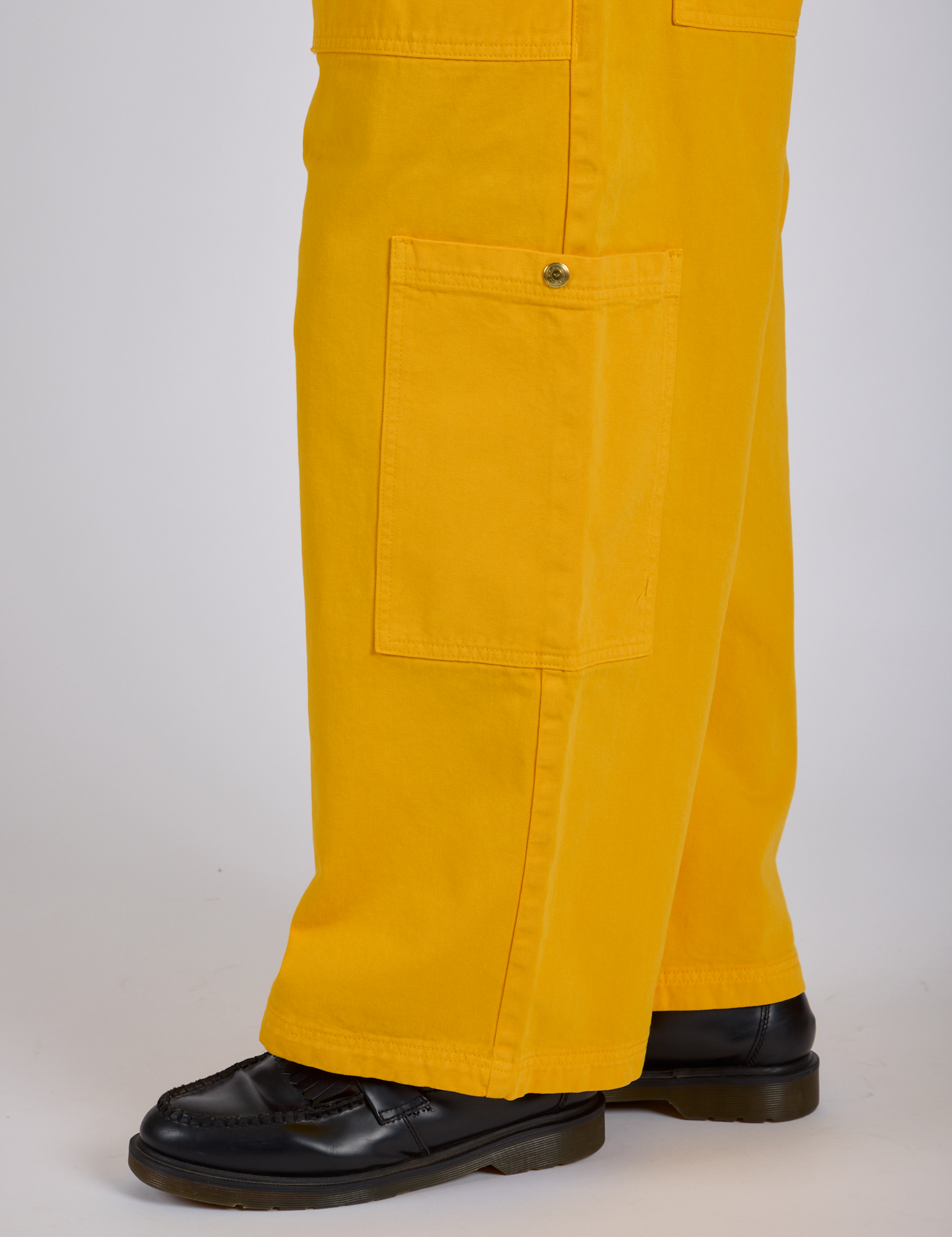 Drop Pocket Cargo Pants in Sunshine Yellow pant leg side view close up on Isaac
