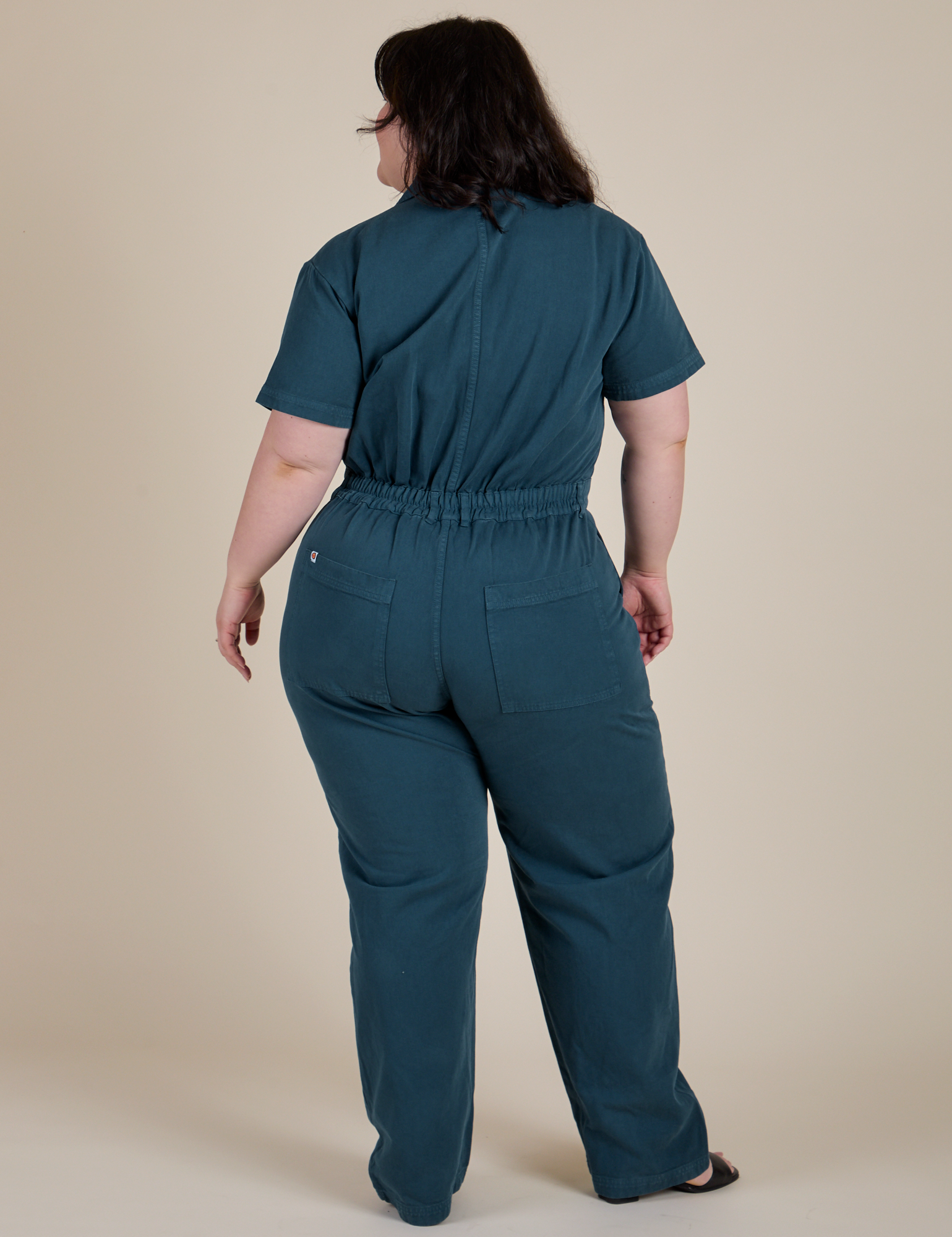 Short Sleeve Jumpsuit in Lagoon back view on Ashley