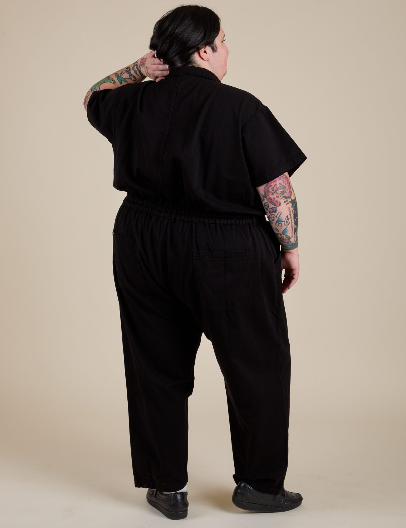 Short Sleeve Jumpsuit in Basic Black back view on Sam