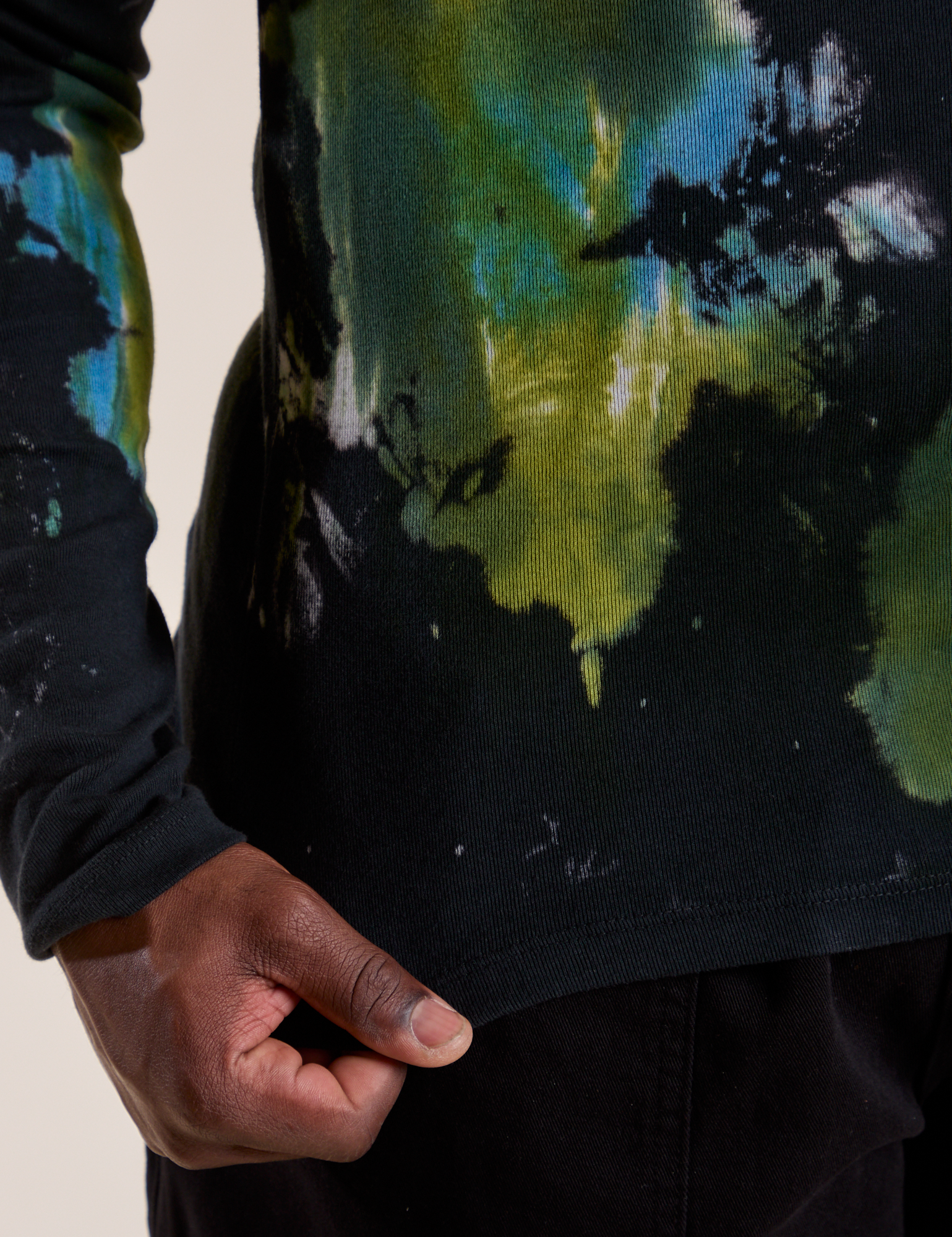 Long Sleeve Baby Tee in Green Pool bottom close up on Demi