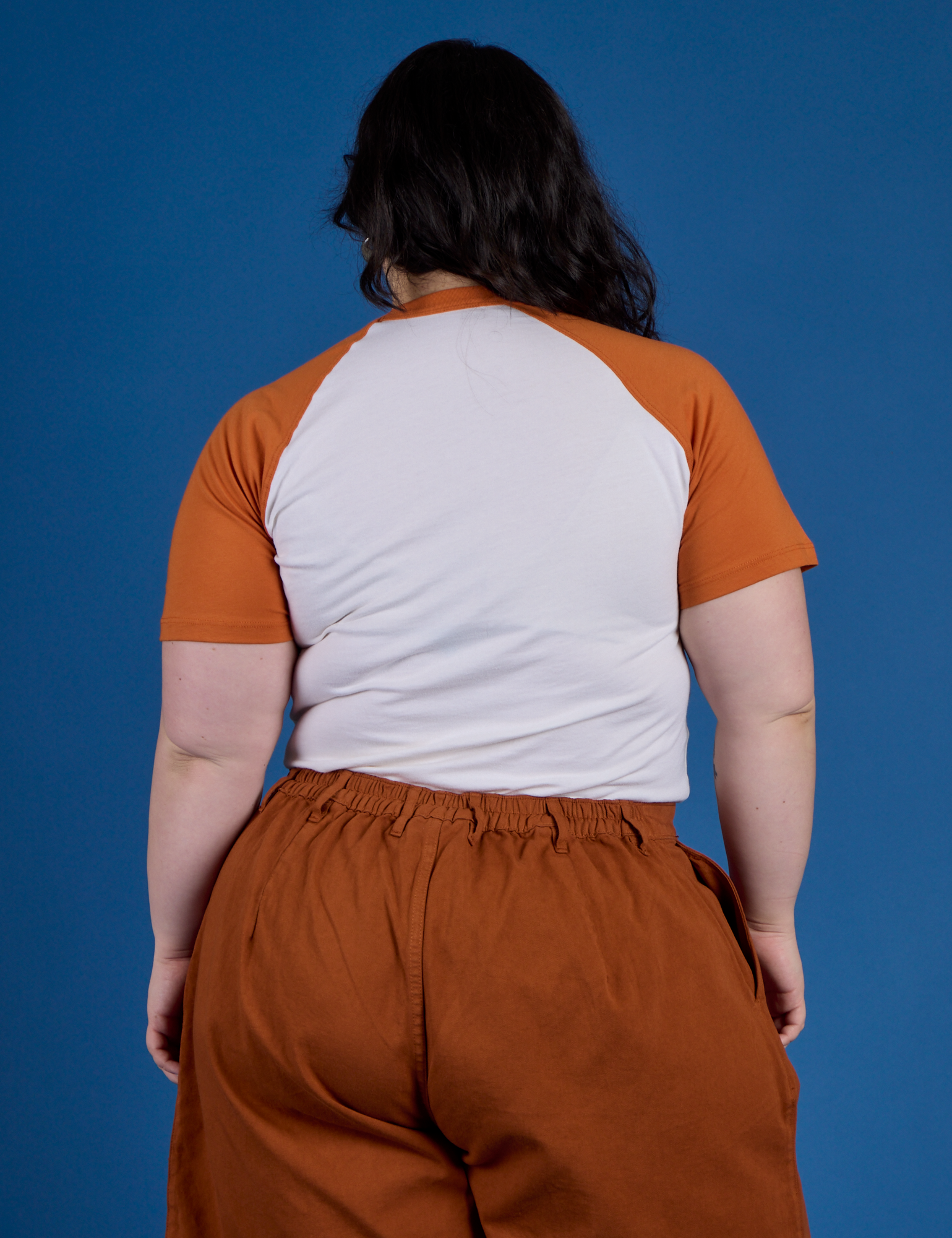 Back view of Produce Raglan Tee in Habanero on Ashley