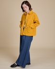 Denim Work Jacket in Mustard Yellow and dark wash Indigo Wide Leg Trousers on Hana