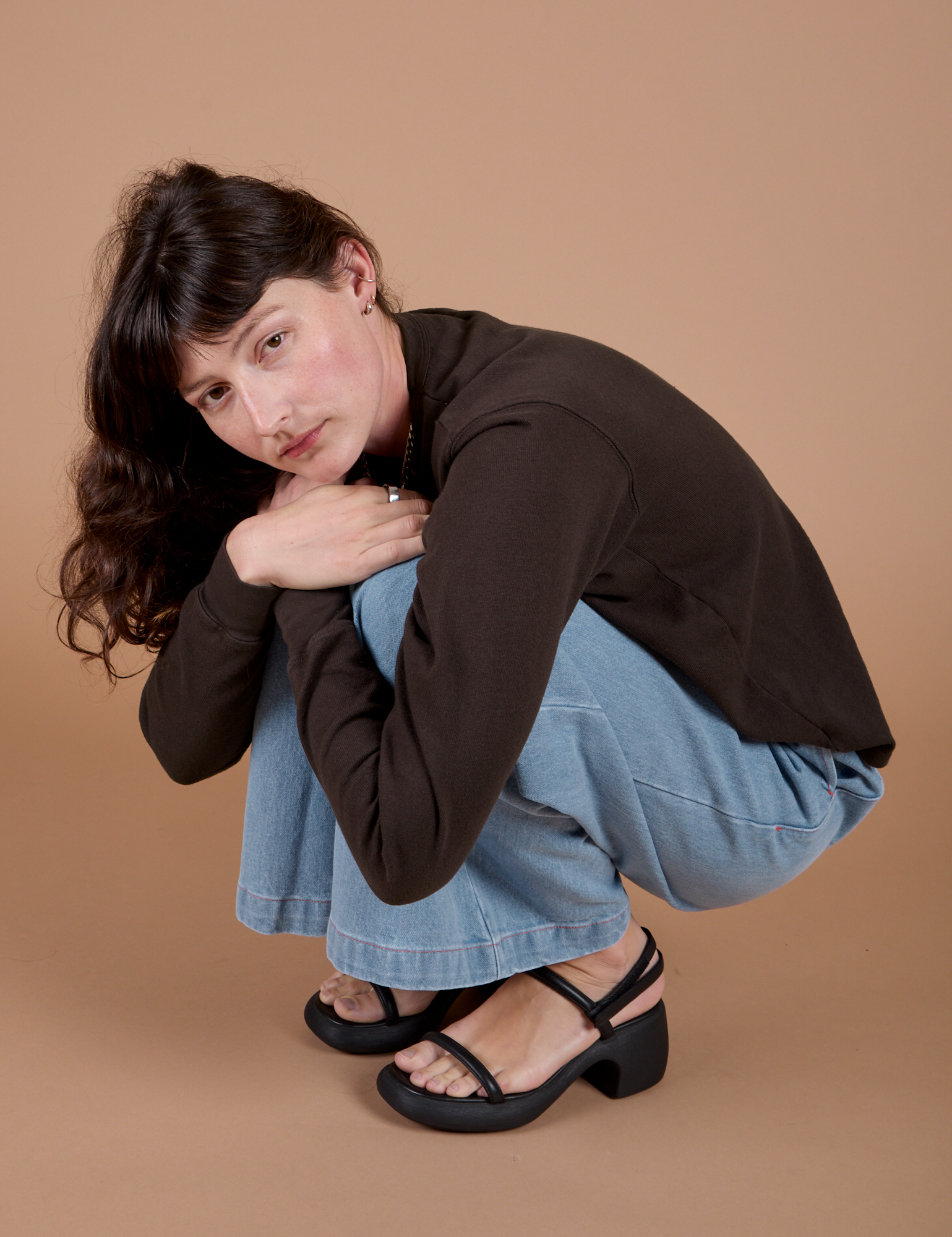 Alex is wearing Long Sleeve Burly Tee in Espresso Brown