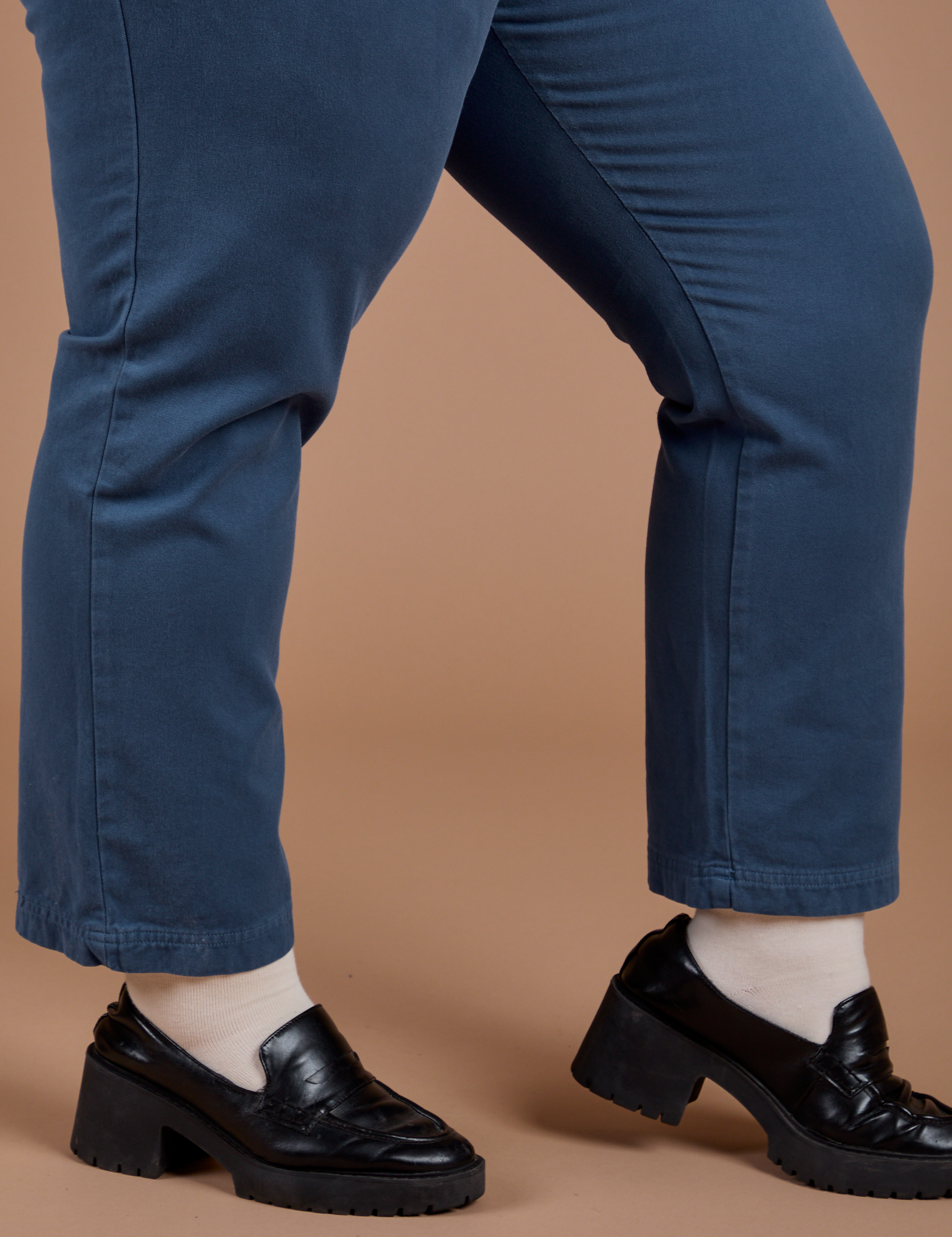 Side view Organic Work Pants in French Blue pant leg close up on Juliet