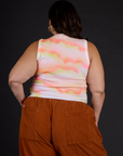 Back view of Kristen wearing the Black Star Airbrush Muscle Tee