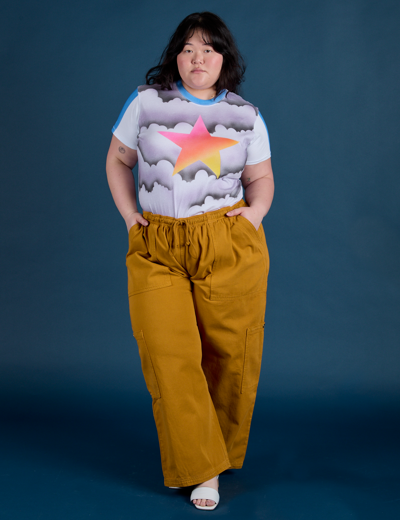 Ashley is wearing Airbrush Star Vintage Tee and spicy mustard Drop Pocket Cargo Pants