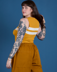Painted Muscle Tee in Mustard Yellow angled back view on Sydney