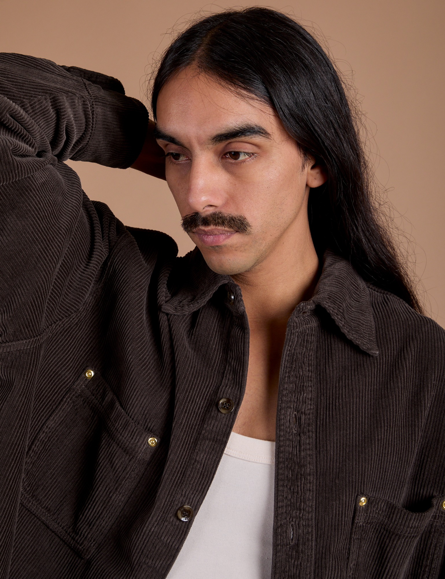 Cropped Corduroy Overshirt in Espresso Brown close up on Anthony