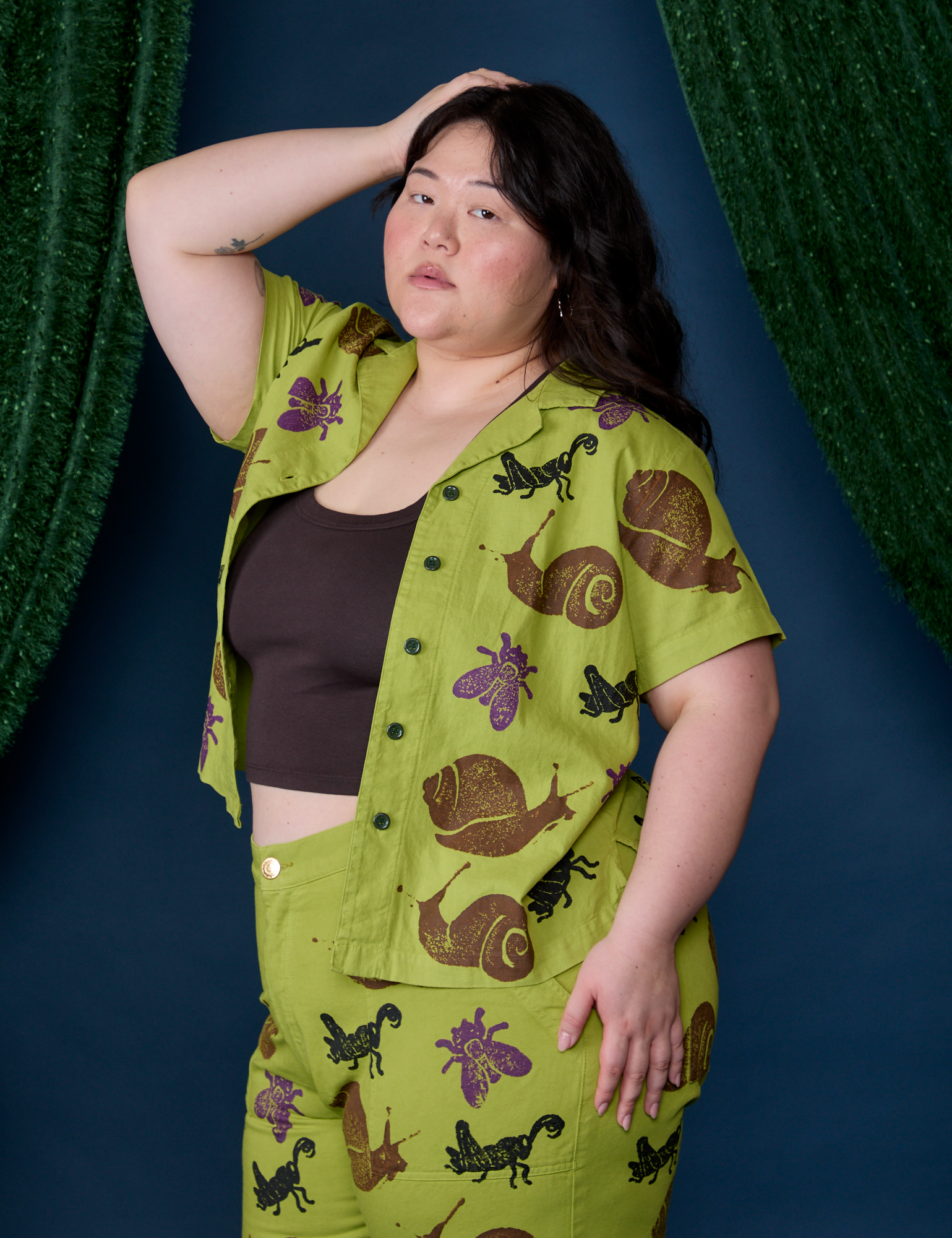 Angled front view of Paintstamped Pantry Button-Up in Big Bug on Ashley