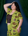 Angled front view of Paintstamped Pantry Button-Up in Big Bug on Ashley
