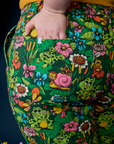 Close up of Ashley's hand in the back pocket of Work Pants in Pond Party