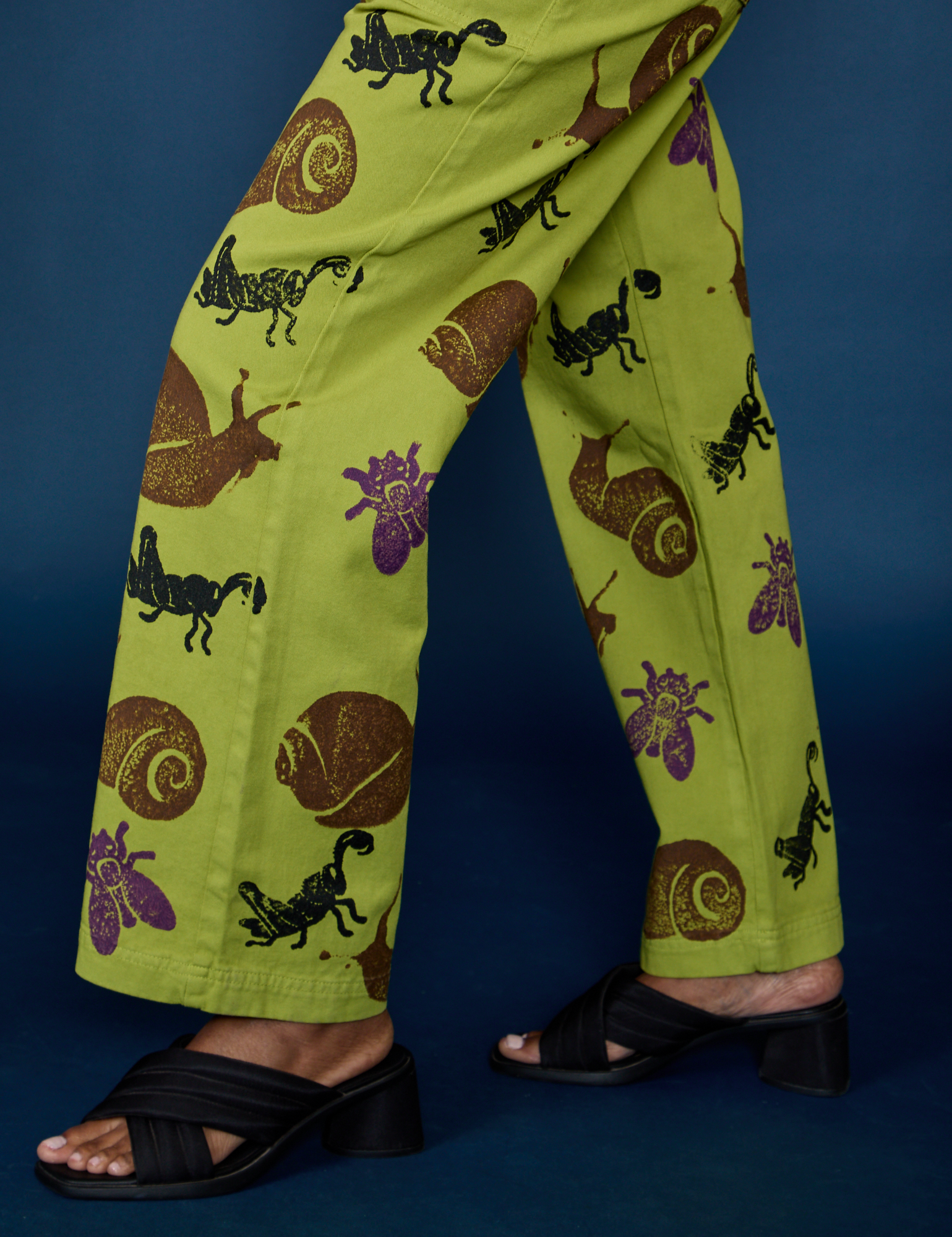 Side view ofPaintstamped Work Pants in Froggy pant leg on Kandia