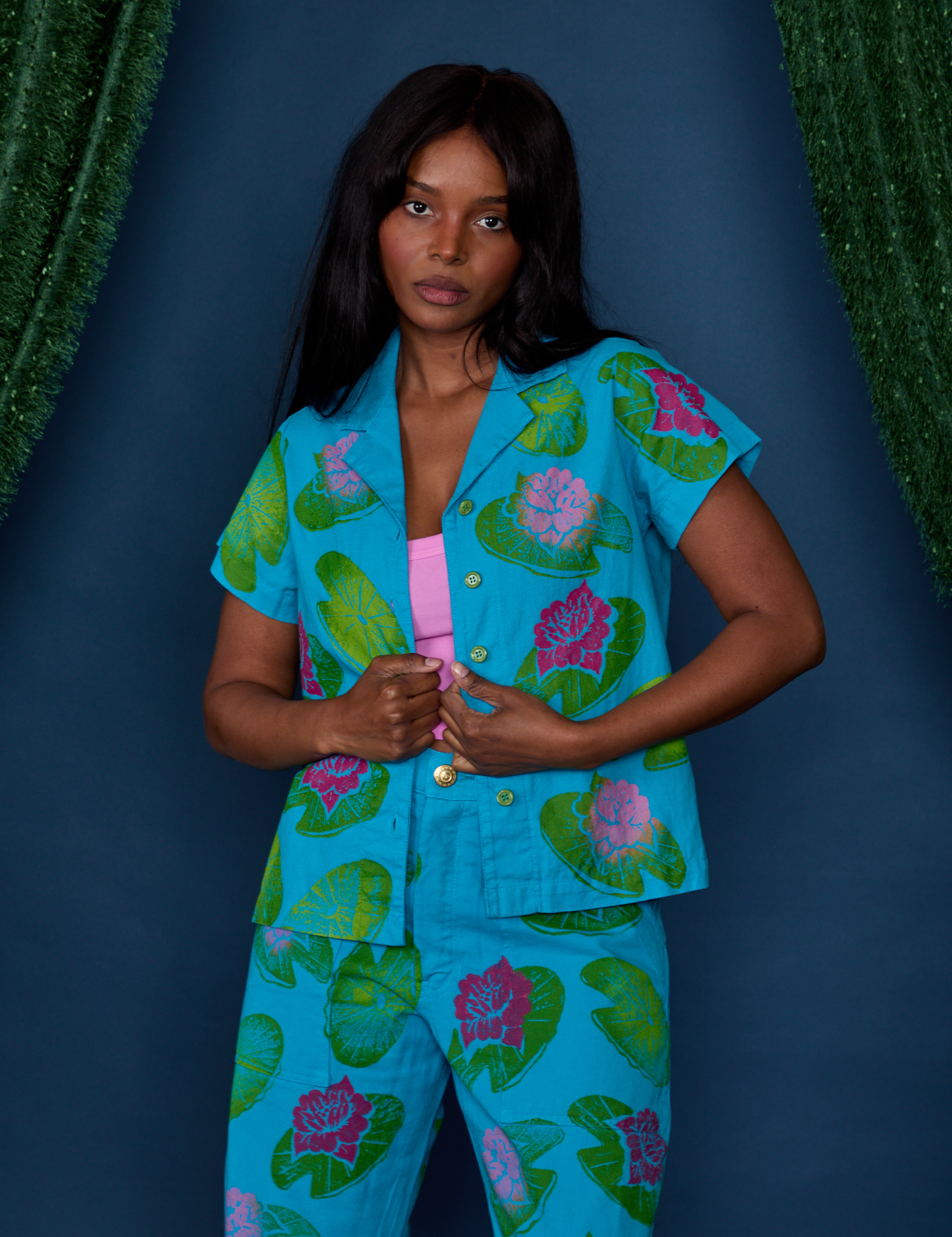 Kandia is wearing Paintstamped Pantry Button-Up in Lilypad