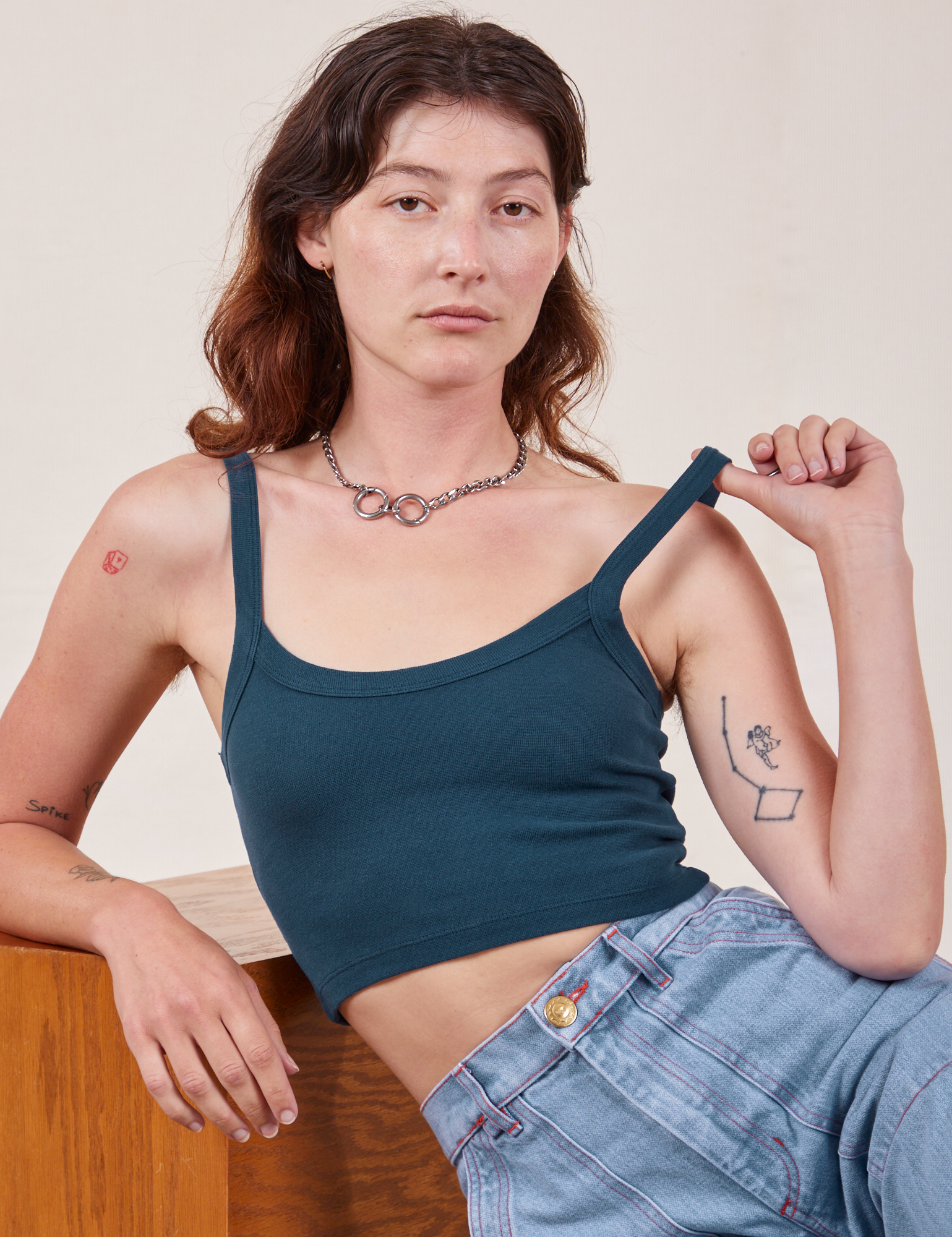 Alex is wearing Cropped Cami in Lagoon