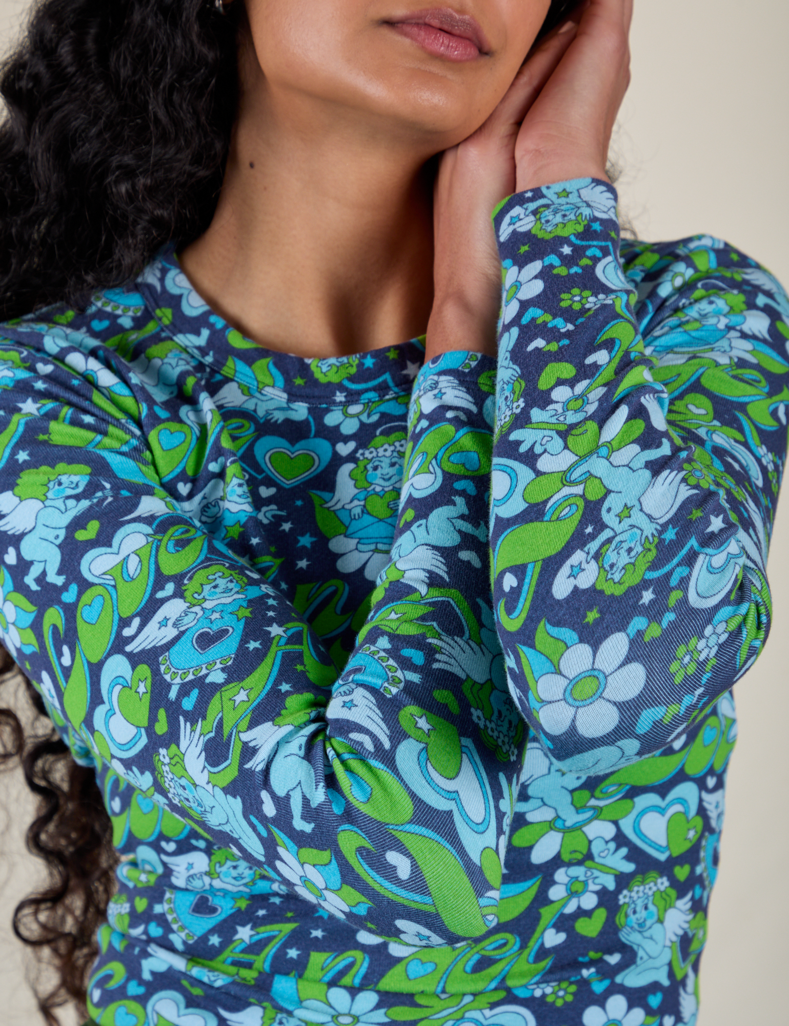 Long Sleeve Baby Tee in Angel Print close up on Shahana