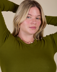 Long Sleeve Baby Tee in Summer Olive front close up on Lish
