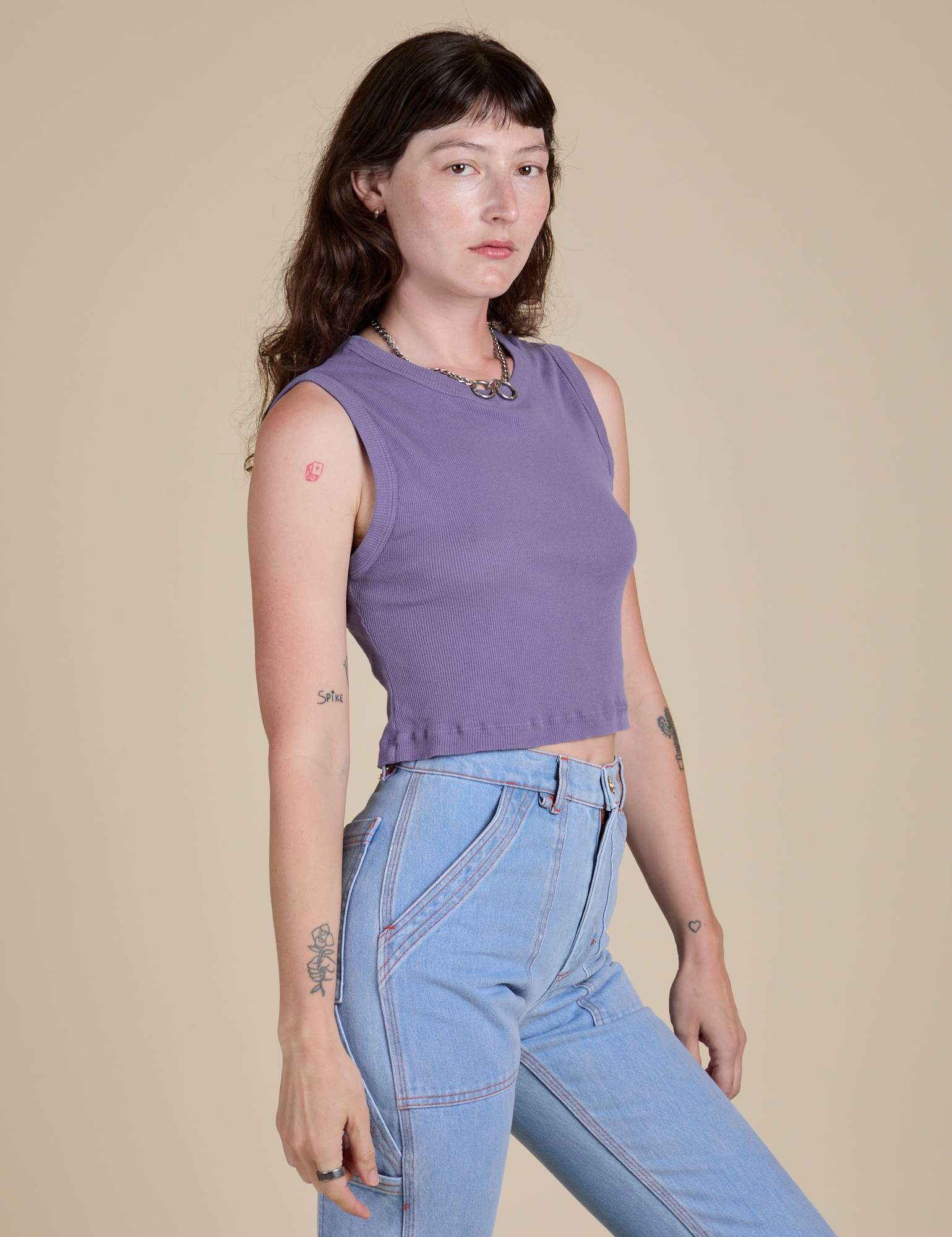 Angled front view of Muscle Tee in Faded Grape on Alex