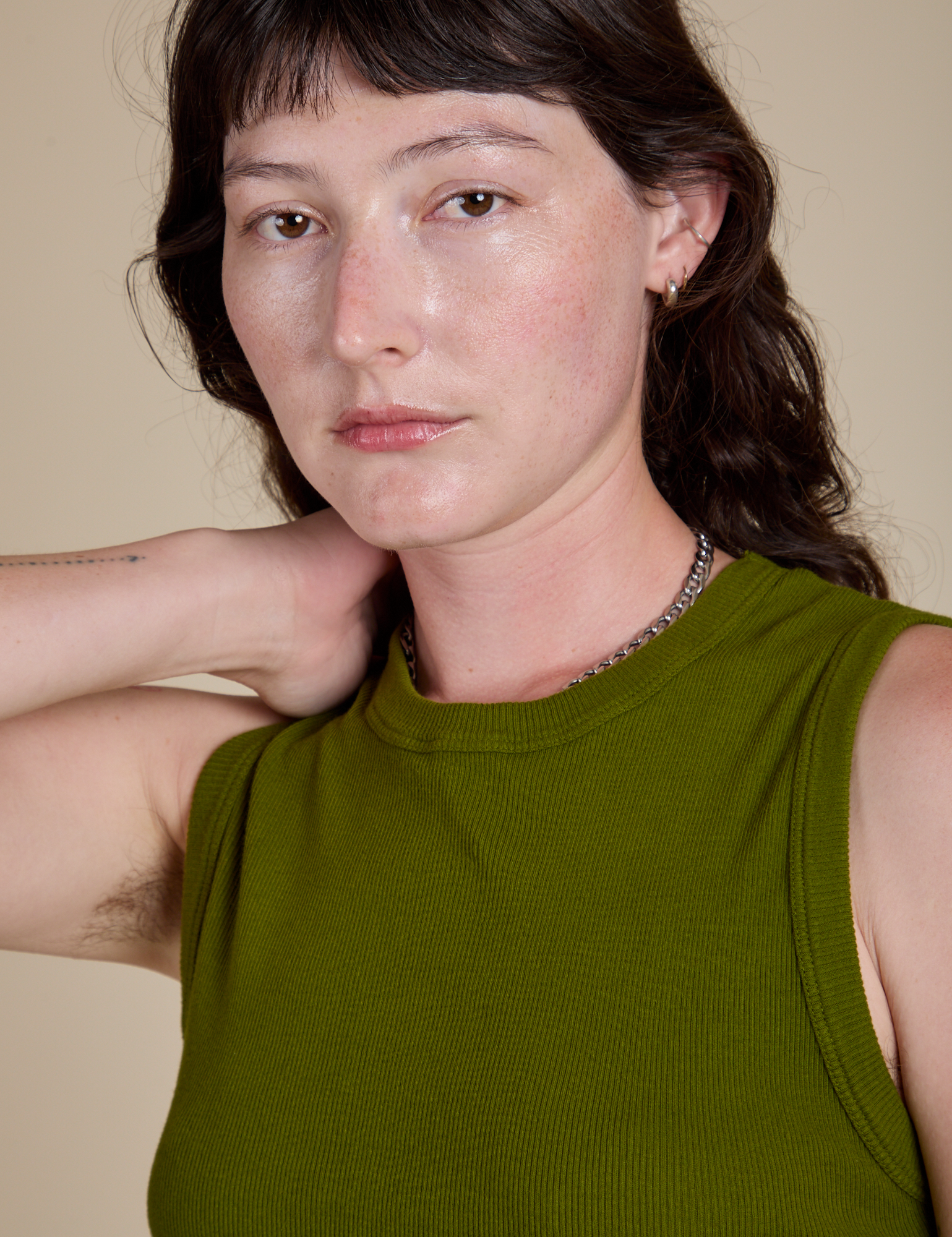 Front close up of Muscle Tee in Summer Olive on Alex