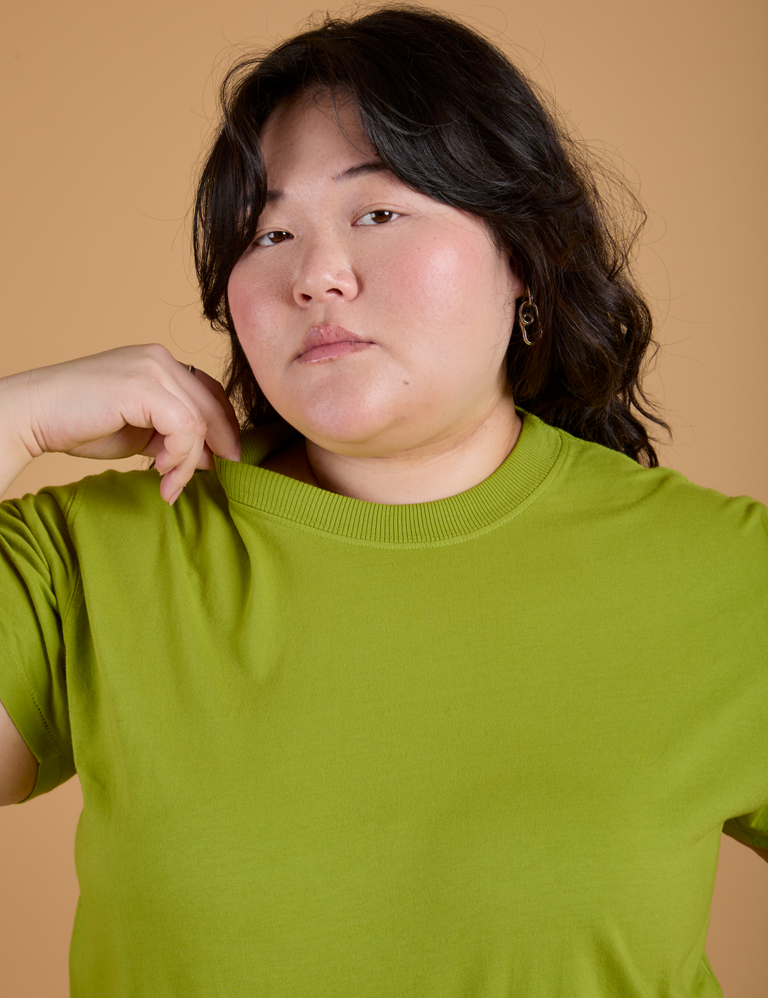 Organic Vintage Tee in Gross Green front close up on Ashley