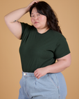 Angled front view of Organic Vintage Tee in Swamp Green on Ashley